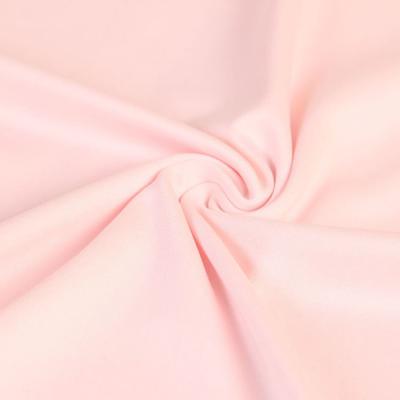 China Stretch Milk Silk Fabric Plain Dyed Knit DTY Stretch Jersey Fabric Milk Silk Fabric for sale