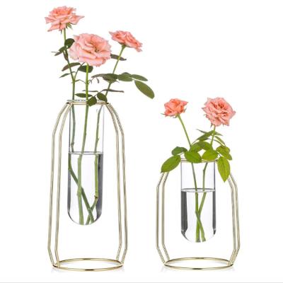 China Modern Clear Gold Geometric Cylinder Frame Holder Glass Vase Centerpiece For Home Office Wedding for sale