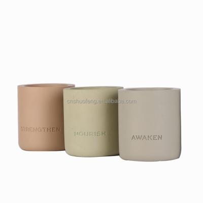 China Home Decoration Customized Creative Cement Candle Holder Colorful Wedding Concrete Candle Jars for sale