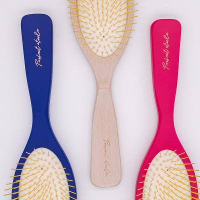 China New viable custom logo hair brush metal pins stiffen wig brush round paddle detangling wooden hair brush for sale