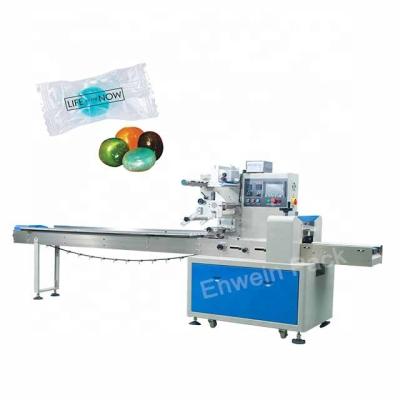 China Food Foshan Maker Single Candy Small Bag Flow Packing Machine With High Speed for sale