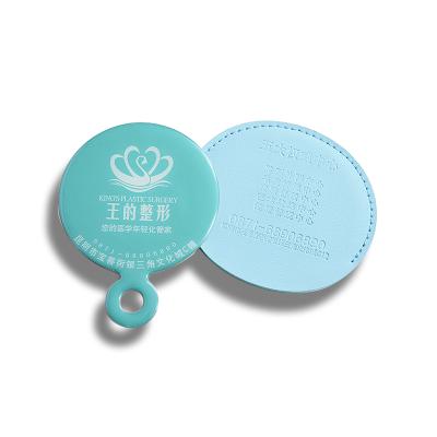 China Personalized Advertising Small Circle Round Logo Mirror Custom Leather Pocket Stainless Steel Epoxy Mirror for sale