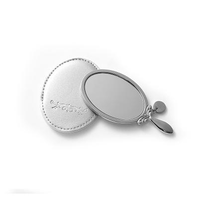 China Custom Portable Mini Purse Mirror Hand Held Oval Shaped Vanity Vintage Hand Held Pocket Mirror for sale