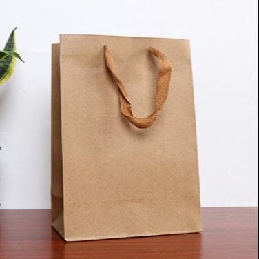 China Recycled Materials Gift Bag Kraft Paper Bag Business Handbag for sale