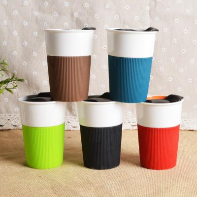 China Viable Customized Silicone PP Cover Insulated Jungle Ceramic Pattern Cup Mugs Ceramic Coffee Mug for sale