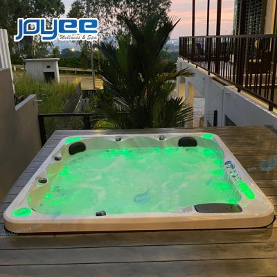 China JOYEE contemporary led waterfall cup holder blue tooh music spa outside hot tub high quality 6 seator bath massage people spas for sale