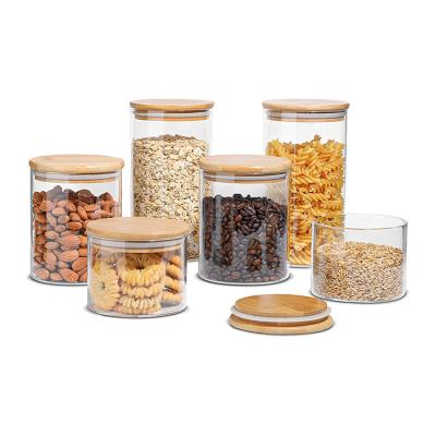 China Freshness Preservation Wholesale Cereal Storage Containers Food Grade Bamboo Clear Glass Tea Canister For Kitchen Home Decor for sale