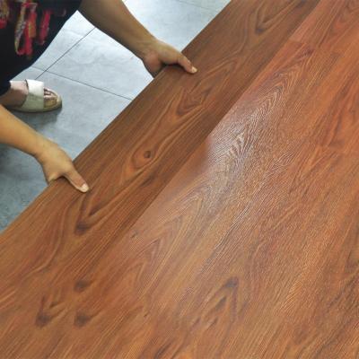 China Low price 2021 anti-slip wear resistant waterproof single spc flooring wooden style vinyl plastic floor tiles for sale