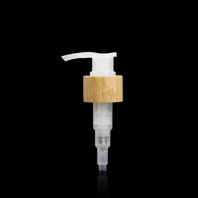 China Non Refillable Solid Emulsion Lotion Pump Wooden Head For Shampoo Liquid Soap Hand Wash for sale