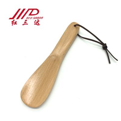 China Best Shoe Care Gift Beech Smooth Shoe Horn For Soft Feet Wear With Custom Kick Leather String Logo Available for sale