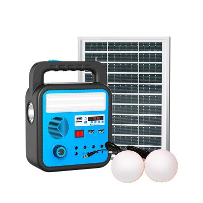 China Outdoor Home or Outdoor Camping Mobile Charging LED Light Kits 2 Bulbs Torch Light Solar Panel Mini Solar System Led Lights with Radio for sale