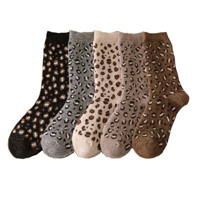 China New breathable fashion leopard women thongs set cotton thicken protective foot cold wool thongs girl style outdoor sports long socks for sale