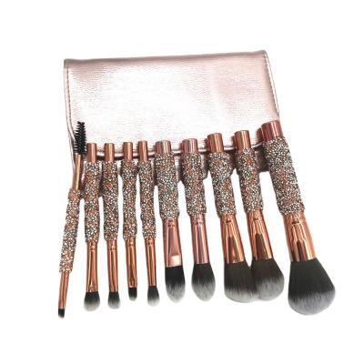 China Angular Blush Beauty Tool High Quality Rose Glitter Handle 10pcs Diamond Base Gold Crystal Set Brush With PU Bag Makeup Brushes for sale