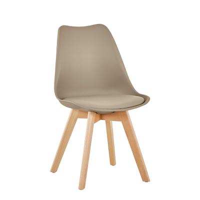 China Free Sample Stable Modern Nordic Wholesale Leather Plastic Dining Furniture Dining Chair With Wooden Legs for sale