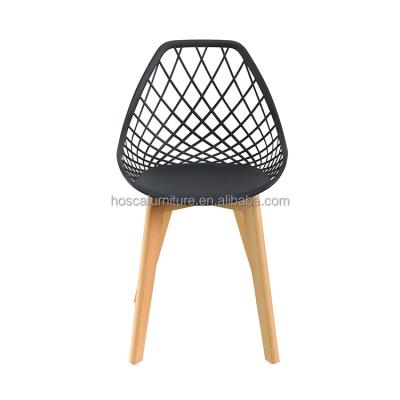 China Free Sample Comfortable Modern Nordic Wholesale Mesh Plastic Chair With Cushion Dining Furniture Wooden Legs Dining Chair for sale