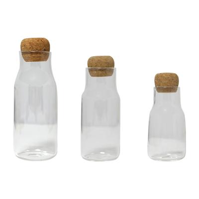 China Sustainable Kitchen Canisters Set Clear Glass Jars For Home Kitchen With Wooden Clamp Lid for sale