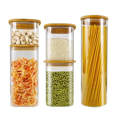 China Viable Home Kitchen Use Bamboo Glass Lids Canisters Clear Glass Food Storage Jar for sale