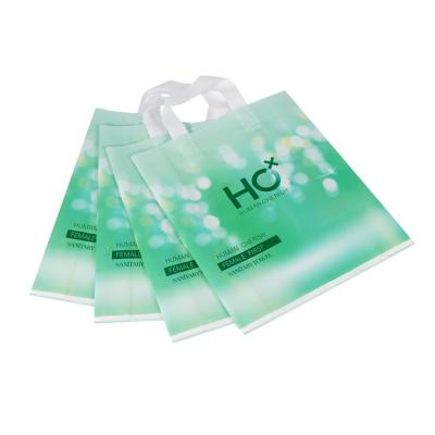 China Best Selling Recyclable Shopping Poly Plastic Bag Biodegradable With Soft-loop Handles for sale