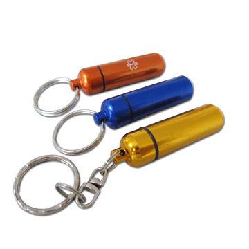 China Various moq colorful sizes low metal custom logo laser engrave aluminum alloy pill holder promotional waterproof capsule Keychains for sale