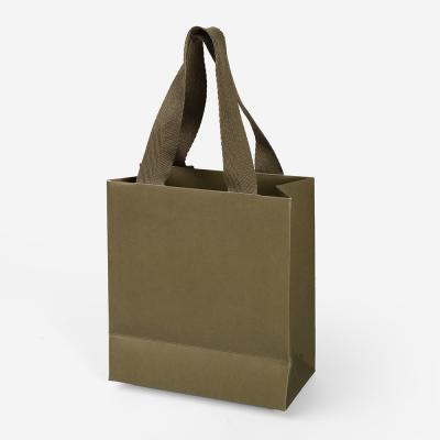 China Recycled Materials Recycled Multifunctional Jewelry Paper Bag Middle Hole To Tie Ribbon Bowknot Specialty Paper Packaging Bag for sale