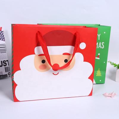 China Factory Wholesale Custom Made Safe And Odorless High Quality Biodegradable Packaging Cartoon Bags Environmentally Foldable Christmas Gift Paper Bags for sale