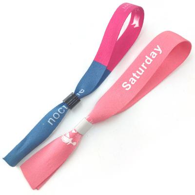 China Waterproof Cheap Disposable Plastic Cloth Slide Lock Wristband With Printing Logo for sale