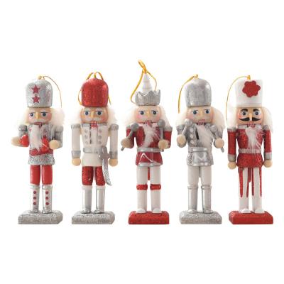 China New Wooden Christmas 13CM Christmas Luminous Pink Gift Puppet Pendant Man Set of Five Small Nutcrackers for sale