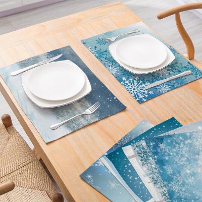 China Snowflake Sustainable Series Christmas Table Mat New Household Cotton And Polyester Western Table Mat Home Cloth Art for sale