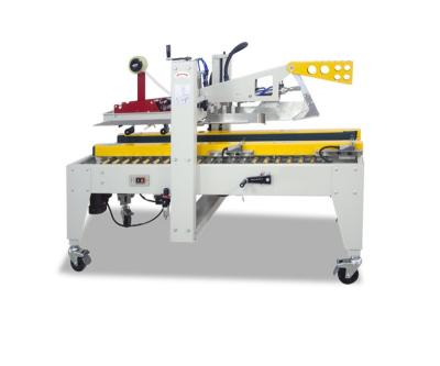 China Hotels Top And Bottom Small Carton Case Taper Sealer Machine for sale