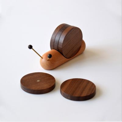 China Sustainable snail-like wooden teacup coaster  Sustainable, Stocked Customized Logo Acceptable for sale