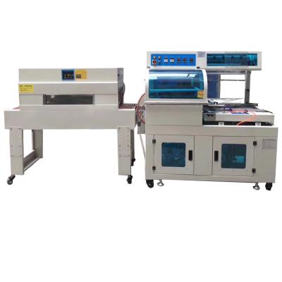 China New Model Food Conveyor Belt Shrink Wrap China Cutting Wrapping Film L Bar Shrink Wrapping Machine for sale