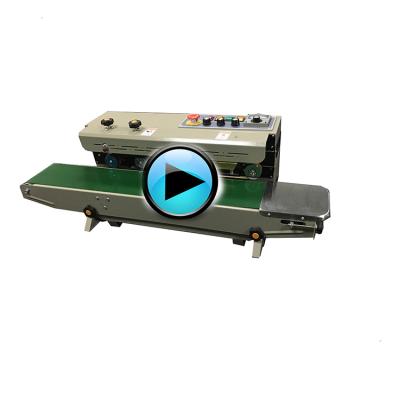 China Hot Selling Beverage PE Bag Heat Sealing Packing Machine With Ink Ribbon Coding Date Printer for sale