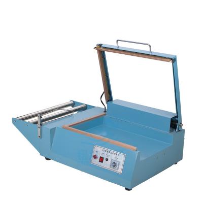 China Manual Beverage Sealing And Slitter Heat Shrinkable Film Sealing Machine for sale