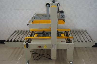 China CLOTHING Hot Selling Automatic Box Sealer Machine For Comic Boxes for sale