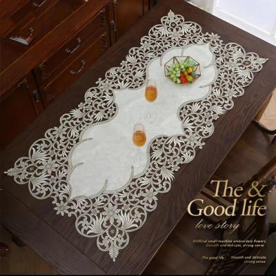 China Viable Scandinavian Luxury Restaurant Table Cloth Table Cover Cloth Embroidered Hollow Floral Pattern Gorgeous Home Decoration for sale