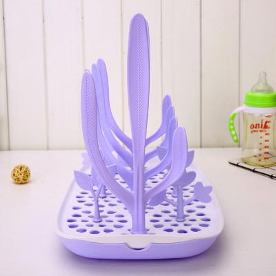 China BPA Free New Design Baby Bottle Drying Cup Holder Helpful Easy Clean for sale