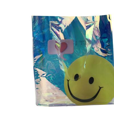 China Luxury Recyclable PVC Hologram Bags Smile Face Shopping Bags Hologram For Women Gift Craft Hologram Bag for sale