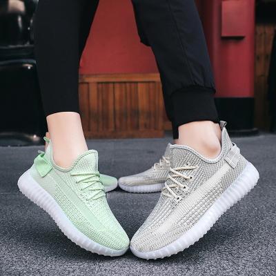 China Fashion Trend JSYA1013 Customized Stylish Sport Fly-weave Walking Man Shoes Unique TPR Man Sneakers Shoes Freeze Shoes for sale