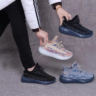 China Waterproof Fly Knitted Womale Brand Sport Shoes Breathable Sneakers Shoes For Running Shoes for sale