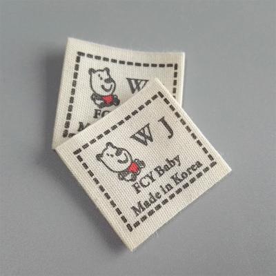 China Sustainable Custom Barcode Printing Korean Japanese-English Woven Washing Label For Apparel for sale