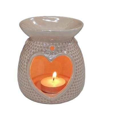 China AROMATIC Porcelain Essential Oil Ceramic Heart Shaped Burner for sale