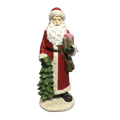 China Europe Resin Christmas Santa With Tree And Present Figurine for sale