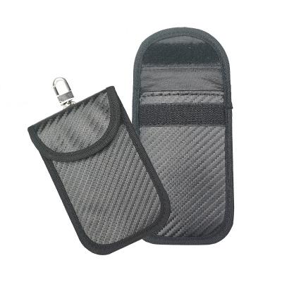 China Fashion car key protector pocket rfid blocking signal car bag carbon fiber key anti tracking buckle protecting rfid safe key bag for sale