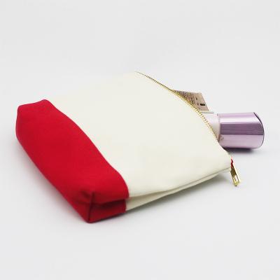 China Normcore / minimalist machine washable and unique cosmetic bag with gold zipper canvas makeup bag for sale