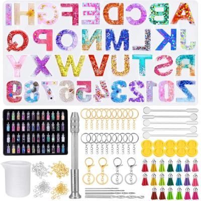 China Viable Epoxy English Alphanumeric DIY Mold Set DIY Earrings Glitter Tassel Silicone Pendant Mold for sale