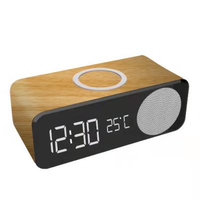 China Wireless charger for the aux led wireless speaker. Cell Phone Speakers Mini Wooden Rechargeable BT Alarm Clock Radio BT Home with Wireless Charging for sale