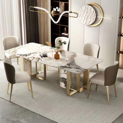 China Modern art unique design custom Italian dining room furniture OEM 6~10 seater chair sintered stone stainless steel dining table for sale