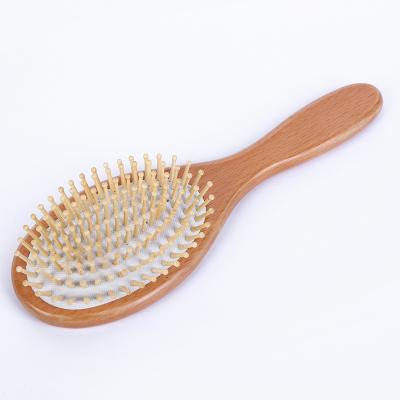 China Hot Selling Home Use Detangling Dampen Comb Anti-static Wholesale Bamboo Hair Brush Comb Scalp Massager for sale