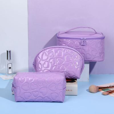 China High Quallity Toiletry Bag For Fashion Women Makeup Case Laser Cosmetic Bags for sale