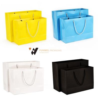 China Recyclable Paper Bag Shopping Luxury Clothes Bag Custom Colors And Logo for sale